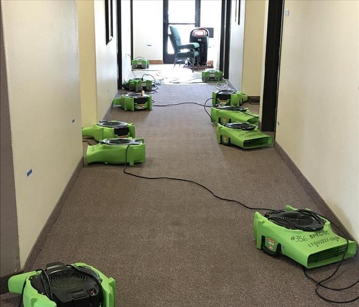 air movers drying corridor, carpeting